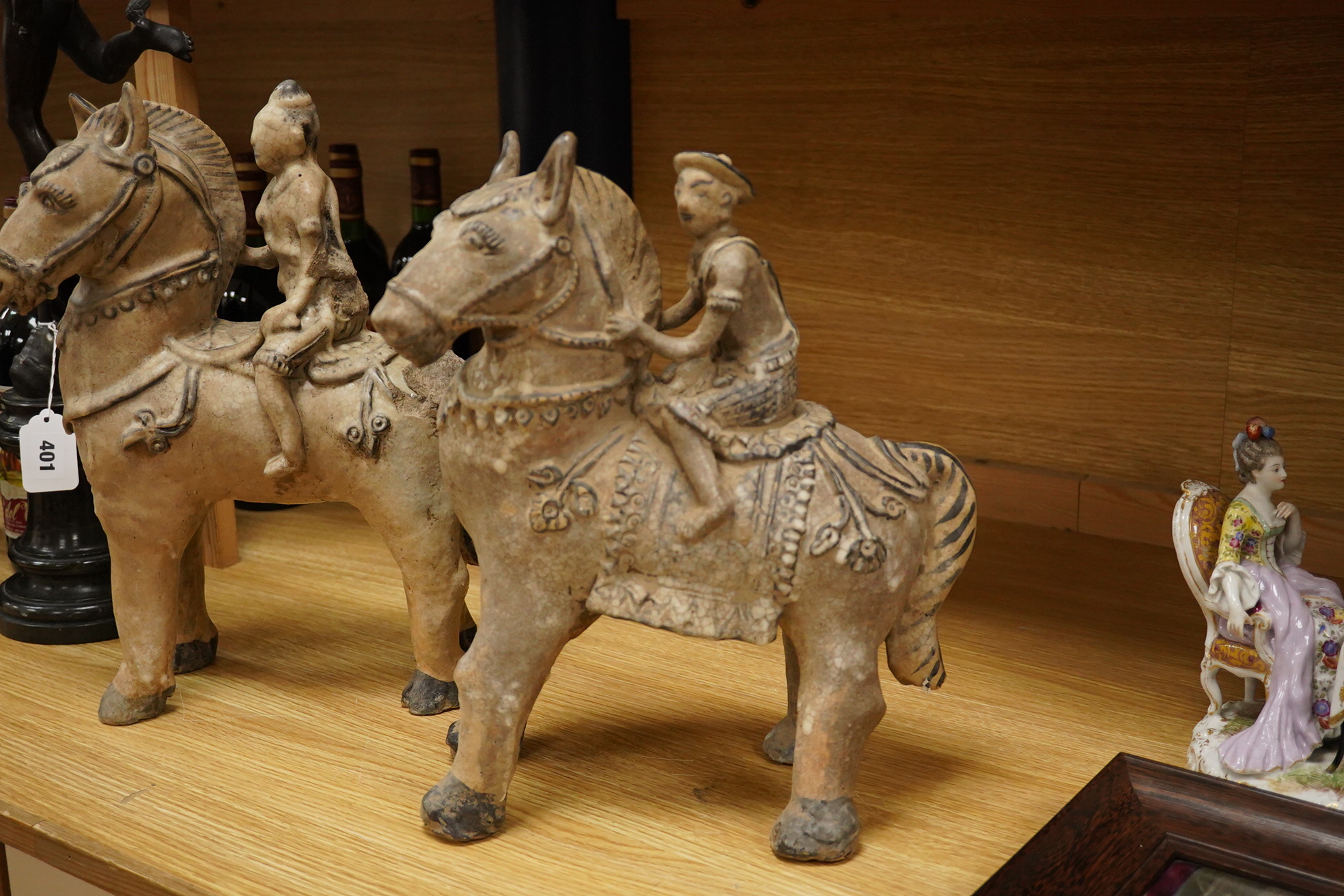 Two large Thai crackle glaze figures on horseback, 39cm high